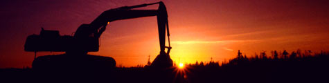 Backhoe at sunset